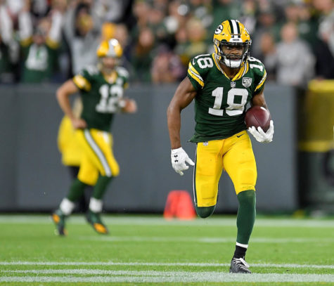 GREEN BAY, WI - SEPTEMBER 09:  Randall Cobb #18 of the Green Bay Packers runs in for a touchdown after catching a pass from Aaron Rodgers #12 during the fourth quarter of a game against the Chicago Bears at Lambeau Field on September 9, 2018 in Green Bay, Wisconsin.  (Photo by Stacy Revere/Getty Images)