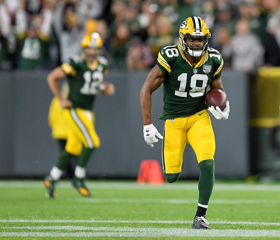 GREEN+BAY%2C+WI+-+SEPTEMBER+09%3A++Randall+Cobb+%2318+of+the+Green+Bay+Packers+runs+in+for+a+touchdown+after+catching+a+pass+from+Aaron+Rodgers+%2312+during+the+fourth+quarter+of+a+game+against+the+Chicago+Bears+at+Lambeau+Field+on+September+9%2C+2018+in+Green+Bay%2C+Wisconsin.++%28Photo+by+Stacy+Revere%2FGetty+Images%29