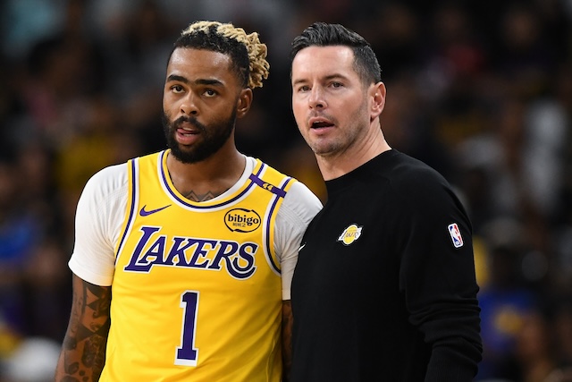 Oct 4, 2024; Palm Desert, California, USA; Los Angeles Lakers head coach JJ Redick talks to guard D'Angelo Russell (1) against the Minnesota Timberwolves during the first half at Acrisure Arena. Mandatory Credit: Jonathan Hui-Imagn Images