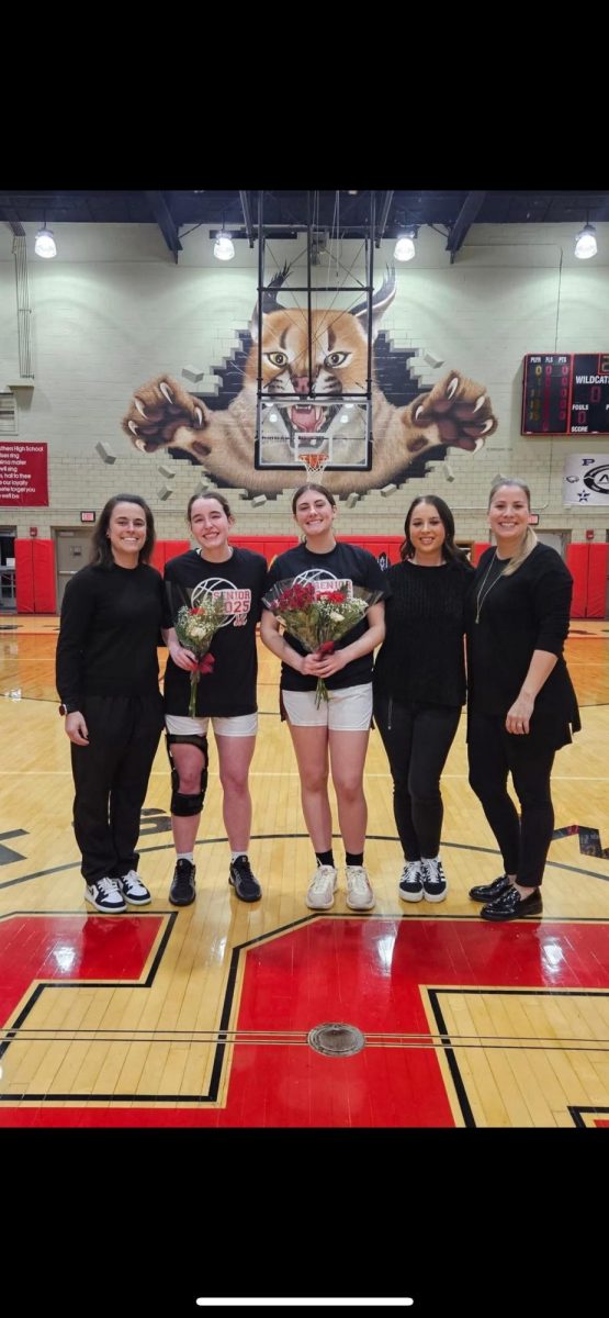 Left to Right: Head Coach Halle Minchin-Skook, Senior Katelyn Kimble, Senior Ava Croyle, Coach Cara Bornemiss, Erica Wilson