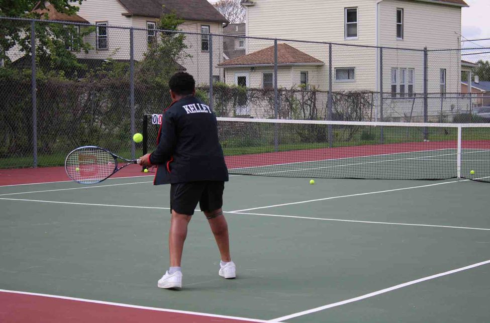 Trayon Kelley, sophomore, plays tennis for the Cats.