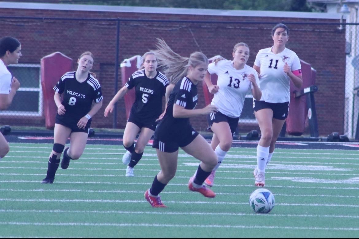Angelina Carcelli, senior, is a striker for the soccer team.