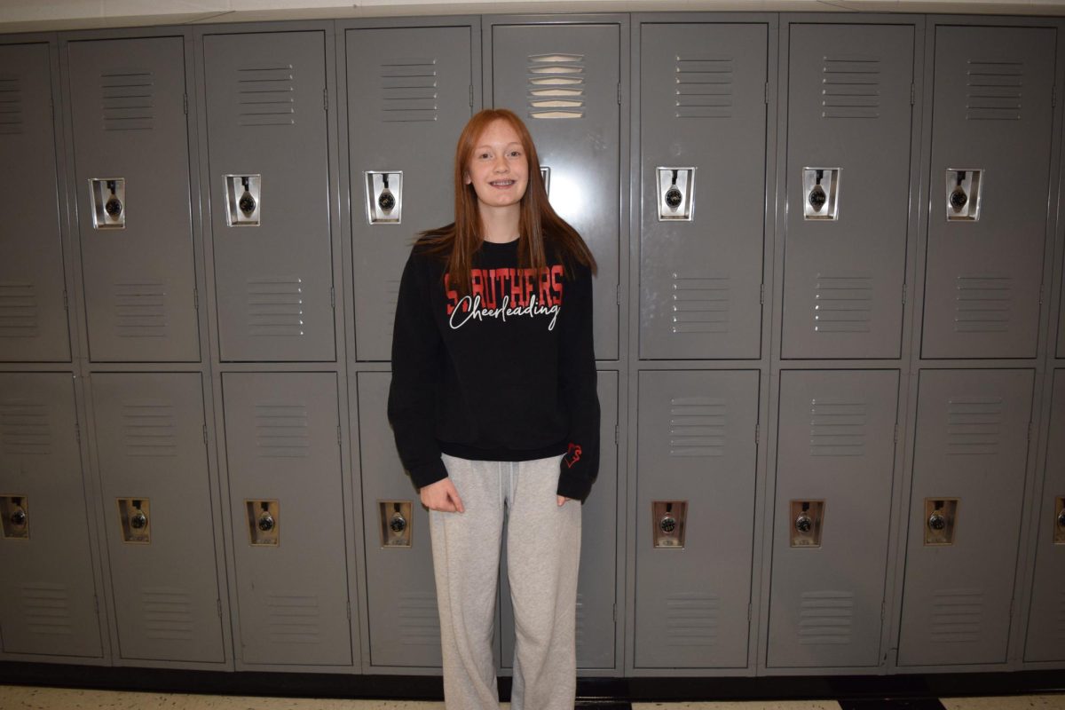 Isabella Dorney, freshman, is on the cheer squad.