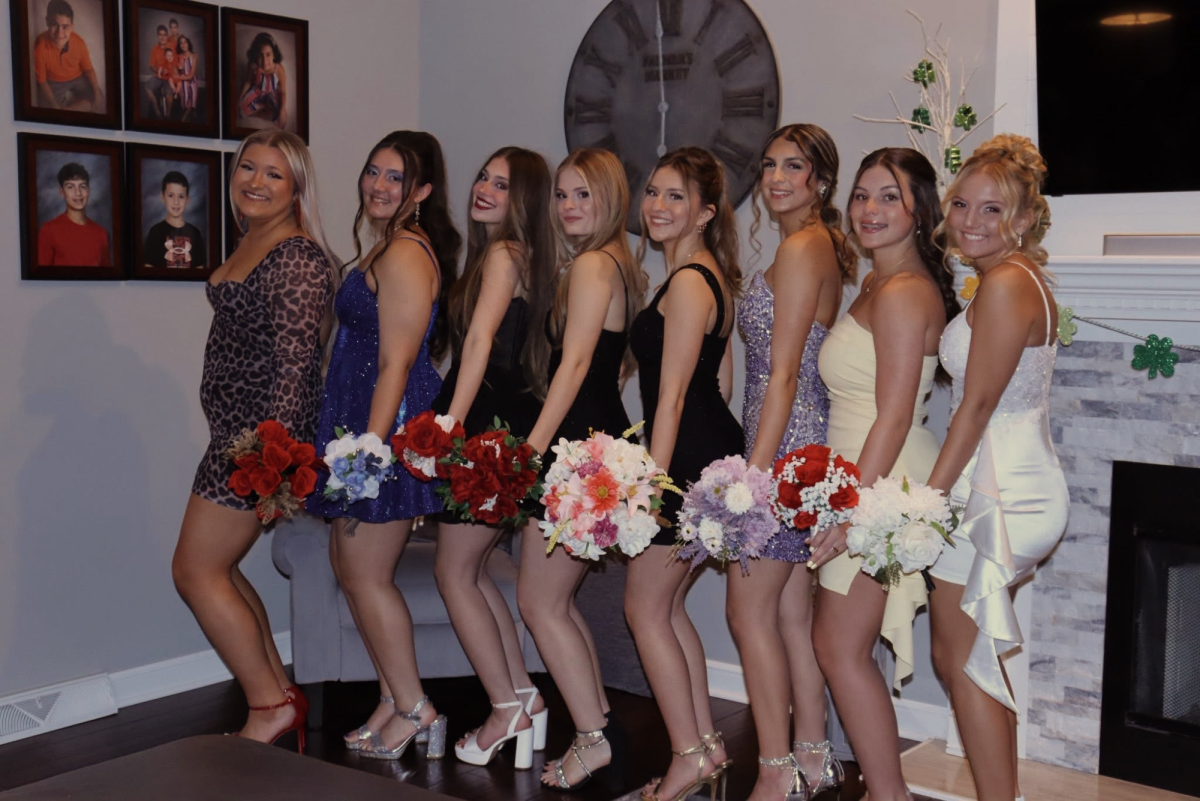 Seniors attended the Winter in Bloom dance. (Left to right): Savanna Russell, Bella Sahli, Ella Hogue, Angelina Carcelli, Samantha Minno, Addison Liptak, Natalee Caldwell, Kylie Schiedel