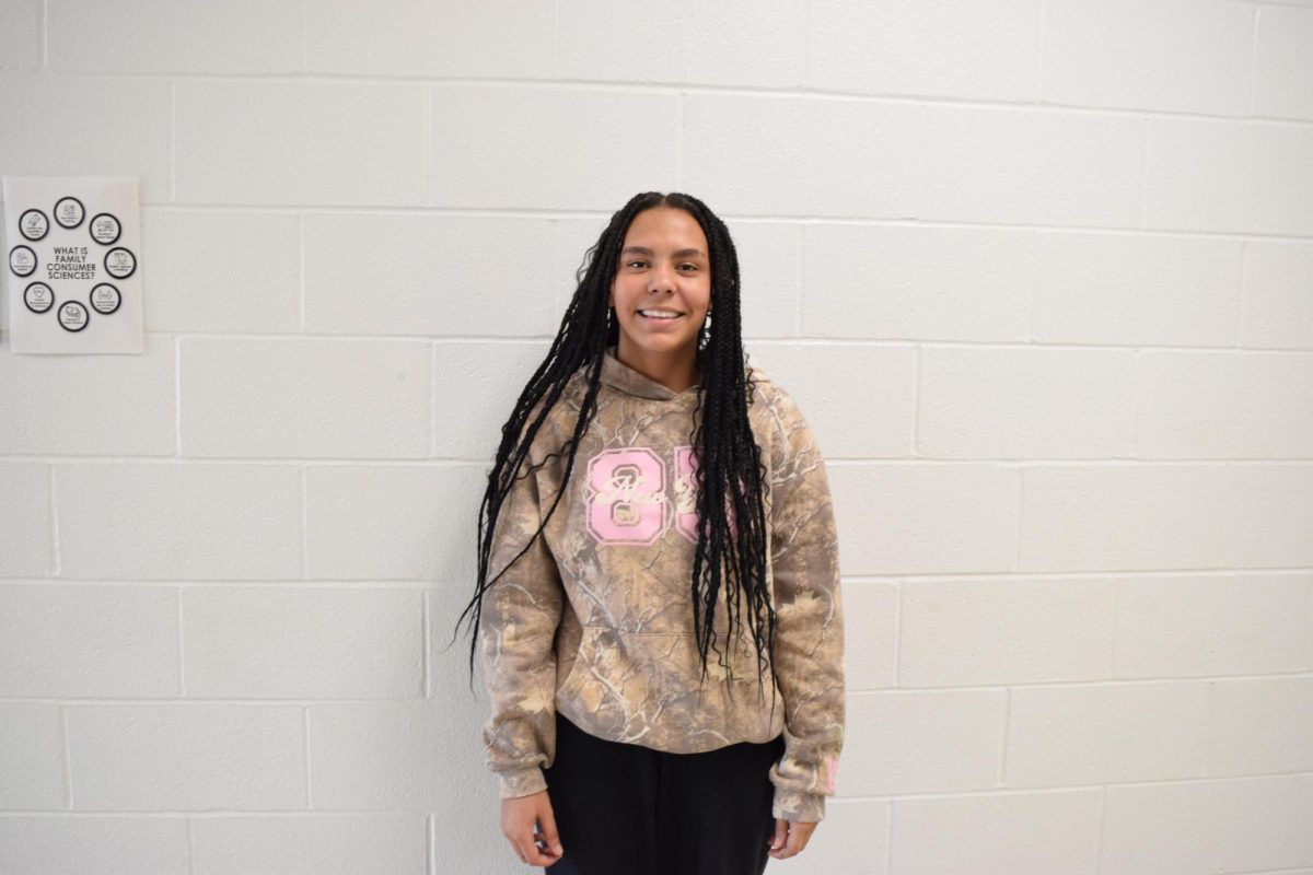 Leah Hall, freshman, is a member of the cheer squad.
