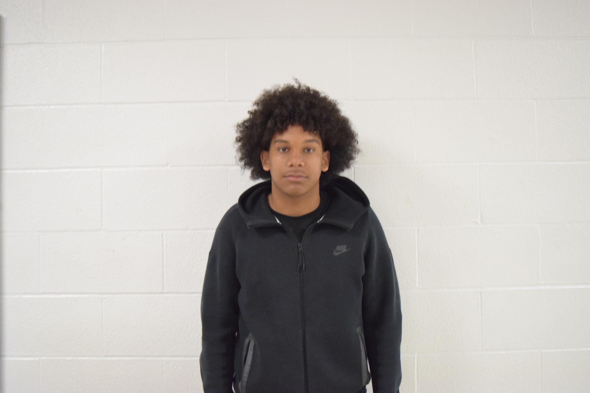 Paul Clark, sophomore, is a member of the defensive line for the Cats.